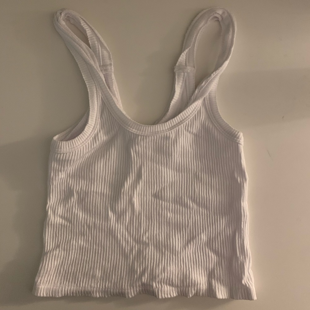 Urban Outfitters out from under tank top